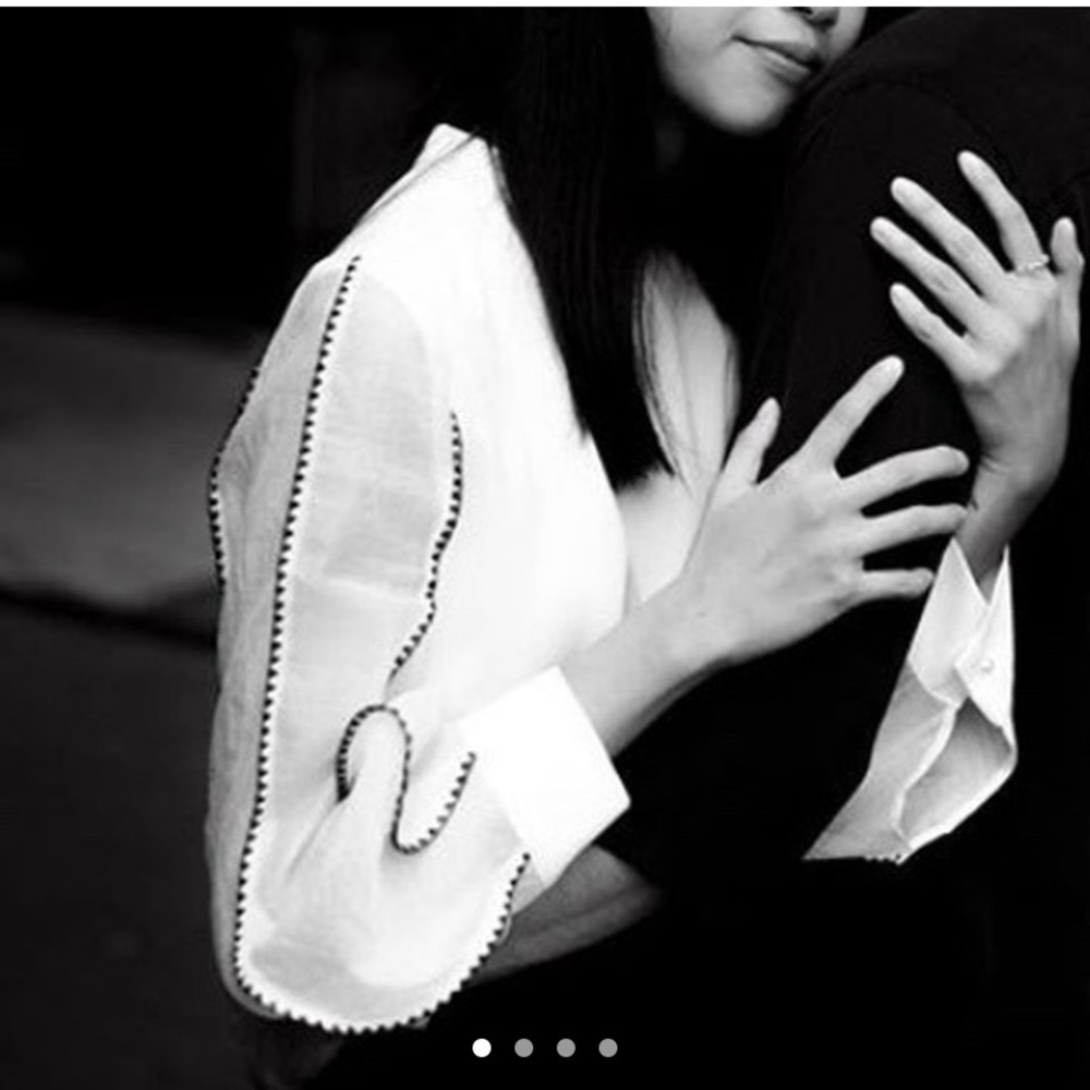 Gorgeous blouse w/ sheer lantern sleeves.